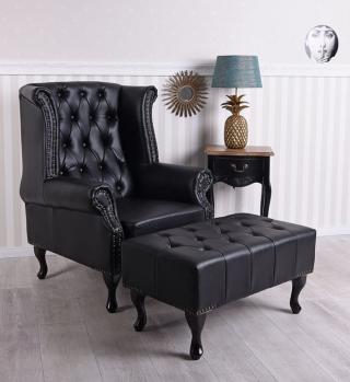 czarny fotel uszak z podnóżkiem styl chesterfield