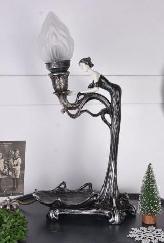 lampa z figurą kobiety i paterą styl secesyjny