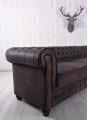narożna sofa klubowa styl chesterfield